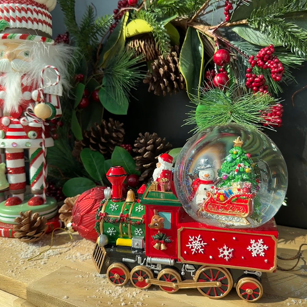 Viv! Christmas Kerst Sneeuwbol incl. muziekdoos - Kerstman in trein - rood - 22cm