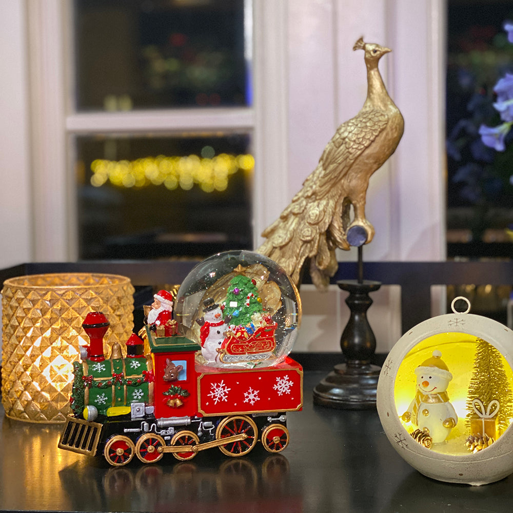 Viv! Christmas Kerst Sneeuwbol incl. muziekdoos - Kerstman in trein - rood - 22cm